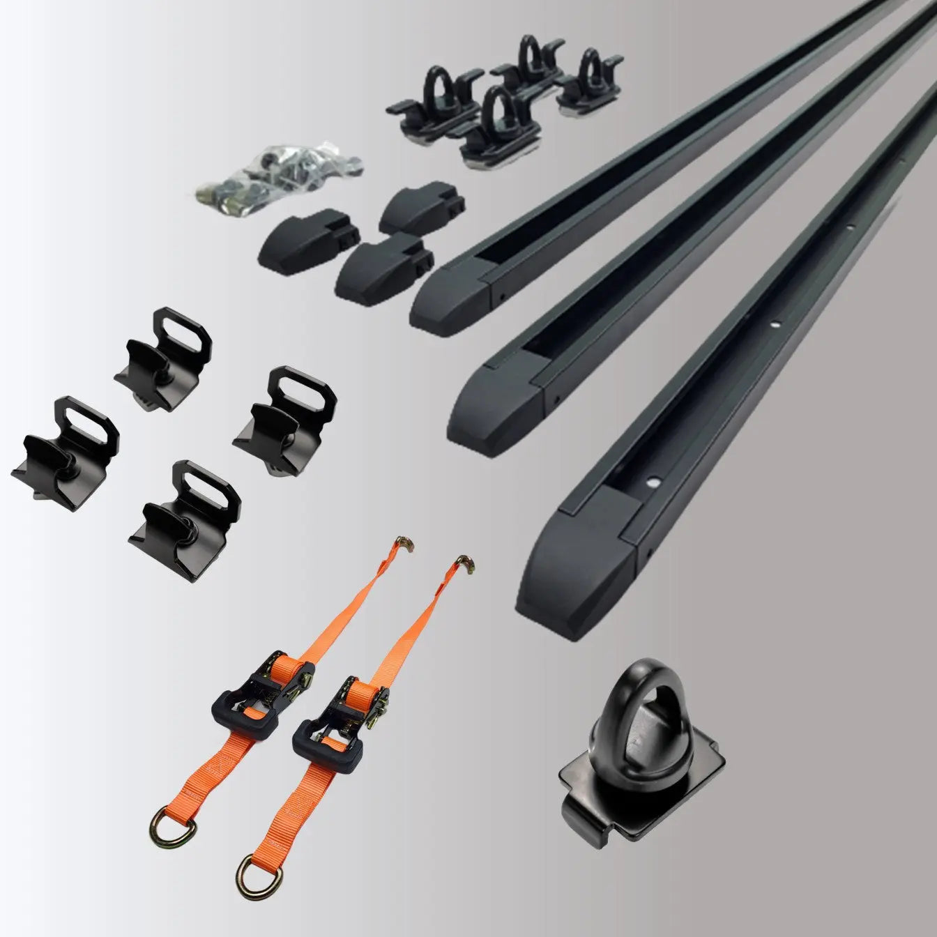 A collection of cargo rail components and accessories, ratchet straps, loop tie downs and rails on a gradient background