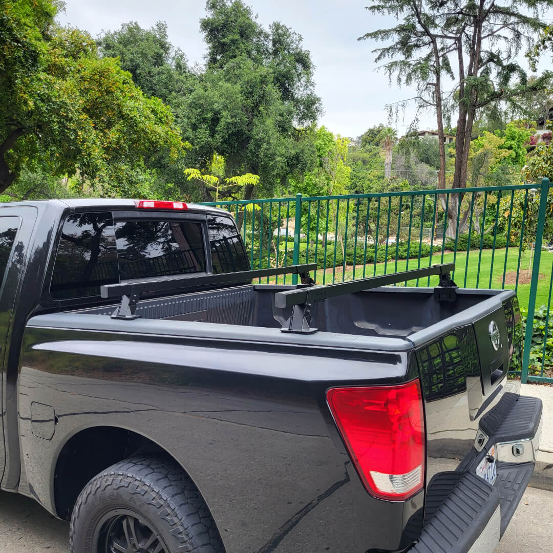 Truck bed cross bars installed on Nissan Titan