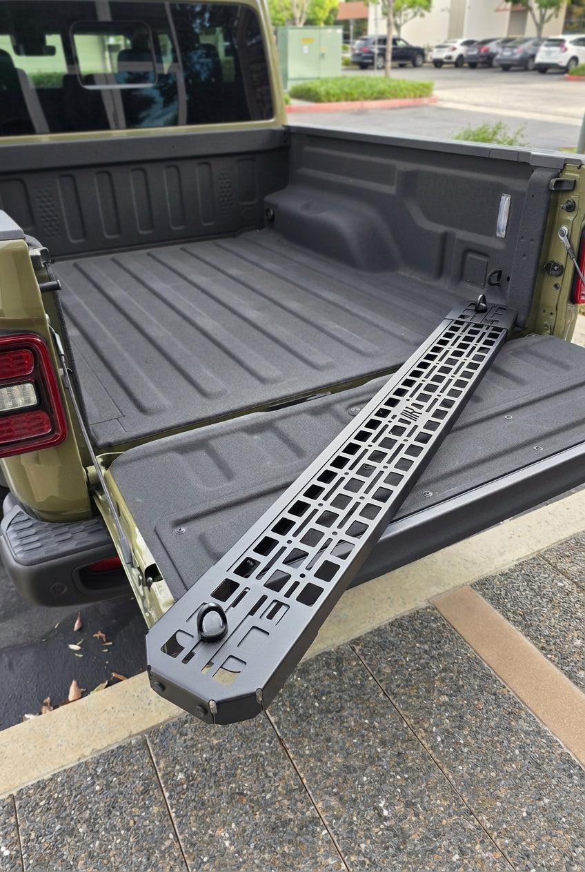 Black powder coated G2 Bed divider displayed on Jeep Gladiator bed.