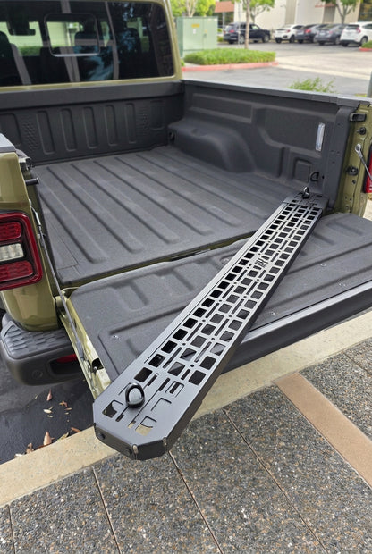 Black powder coated G2 Bed divider displayed on Jeep Gladiator bed.
