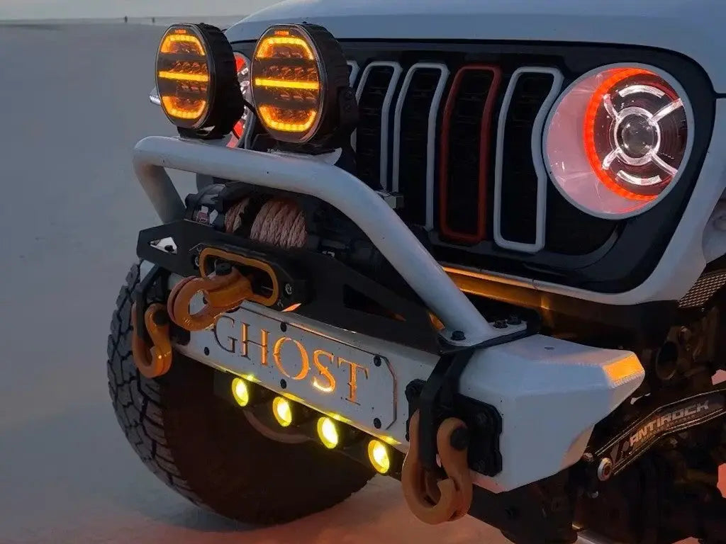 Close-up of stubby front bumper with 'GHOST' branding and additional lights.