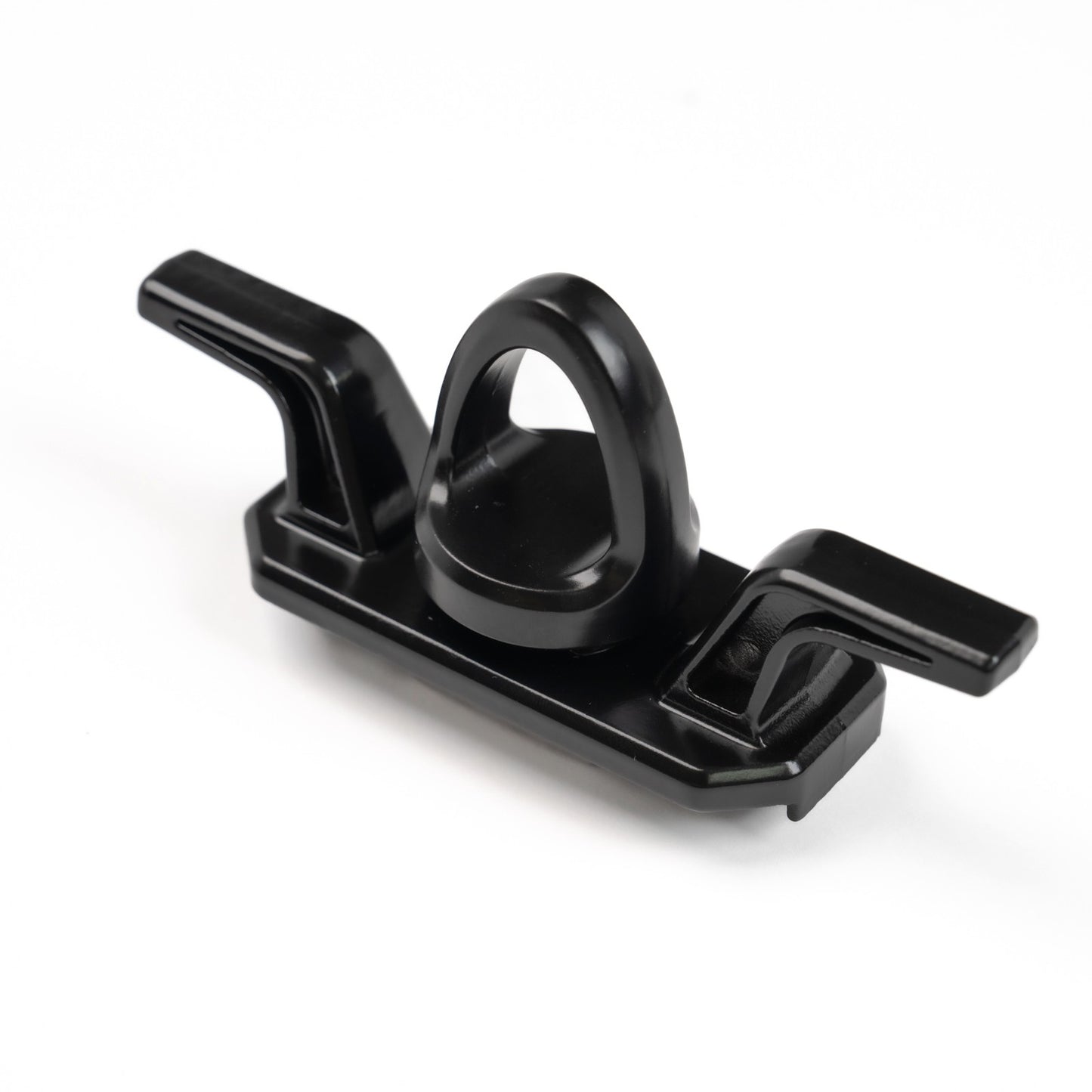 Tie down for strut channel