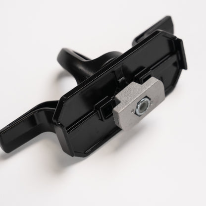 Tie down for strut channel mounting nut