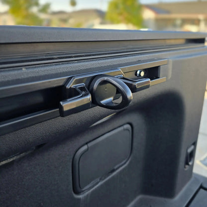 Rivian R1T cargo rail tie down
