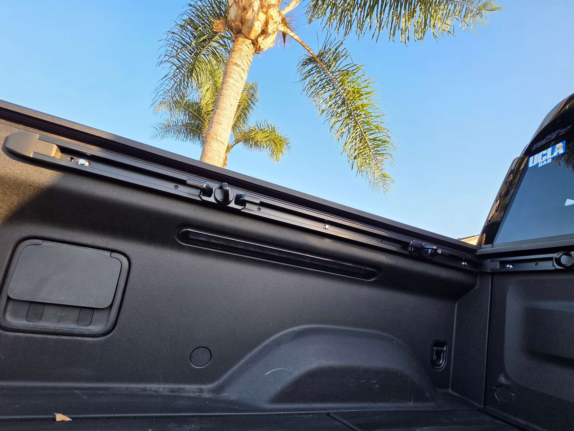 Rivian R1T side cargo bed rail picture installed with tie downs