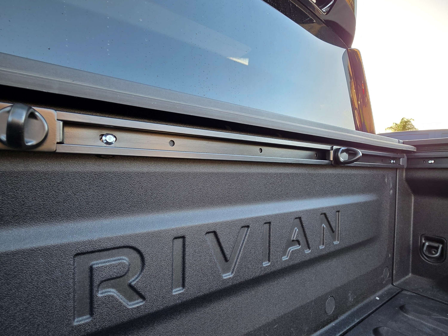 Rivian R1T cargo rail bulkhead cargo rail installed