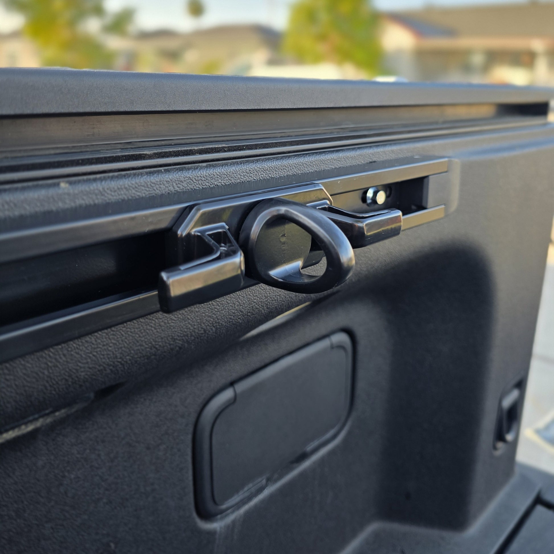 Rivian R1T cargo rail tie down