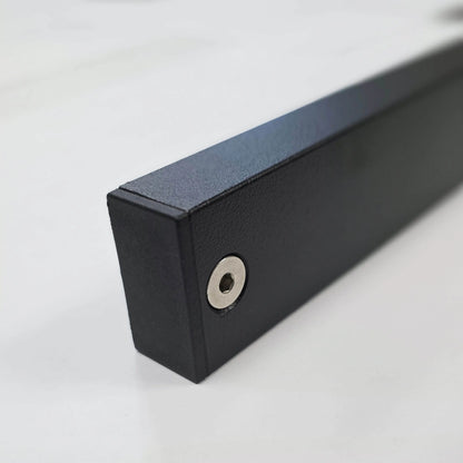 detail view of pinch weld cover with stainless steel accent screw